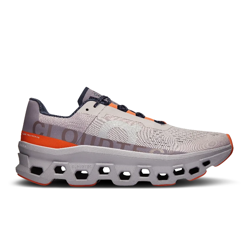 Stretchable Fabric Women's Running Shoes in Orange for a Snug and Flexible FitCloudmonster Stretchable Fabric Women's Running Shoes in Orange for a Snug and Flexible FitCloudmonster