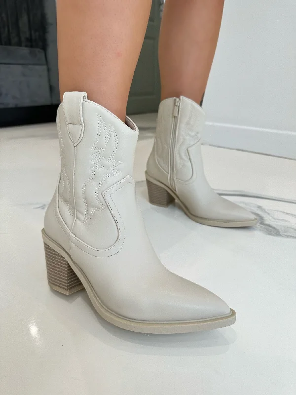 women's heeled boots in neutral colorsMiley - Cream Short Ankle Faux Leather Heeled Cow Boy Boots women's heeled boots in neutral colorsMiley - Cream Short Ankle Faux Leather Heeled Cow Boy Boots