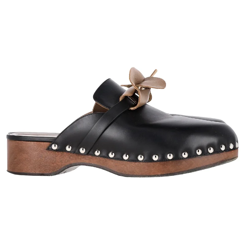 Women's Glitter Mules in Silver for a Shiny and Eye - Catching New Year's PartyHermès Carlotta Clog Mules in Black Calfskin Leather Women's Glitter Mules in Silver for a Shiny and Eye - Catching New Year's PartyHermès Carlotta Clog Mules in Black Calfskin Leather