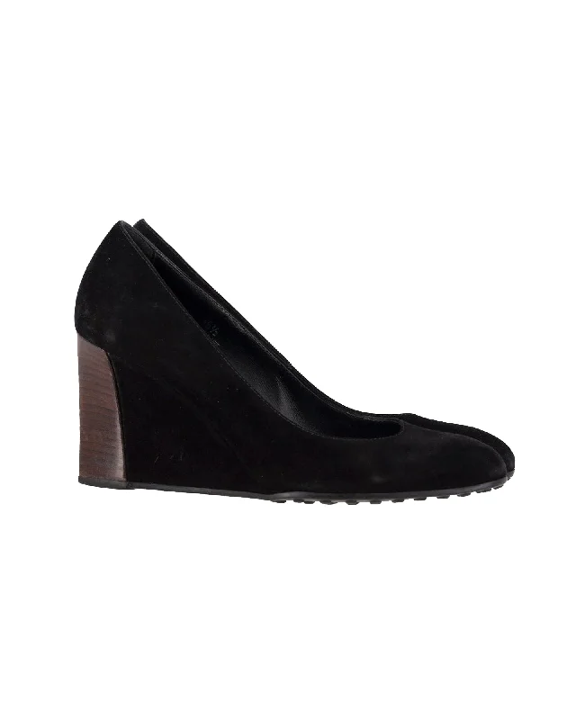 Women's espadrilles with canvas uppers for a classic lookTod's Wedge Pumps in Black Suede Women's espadrilles with canvas uppers for a classic lookTod's Wedge Pumps in Black Suede